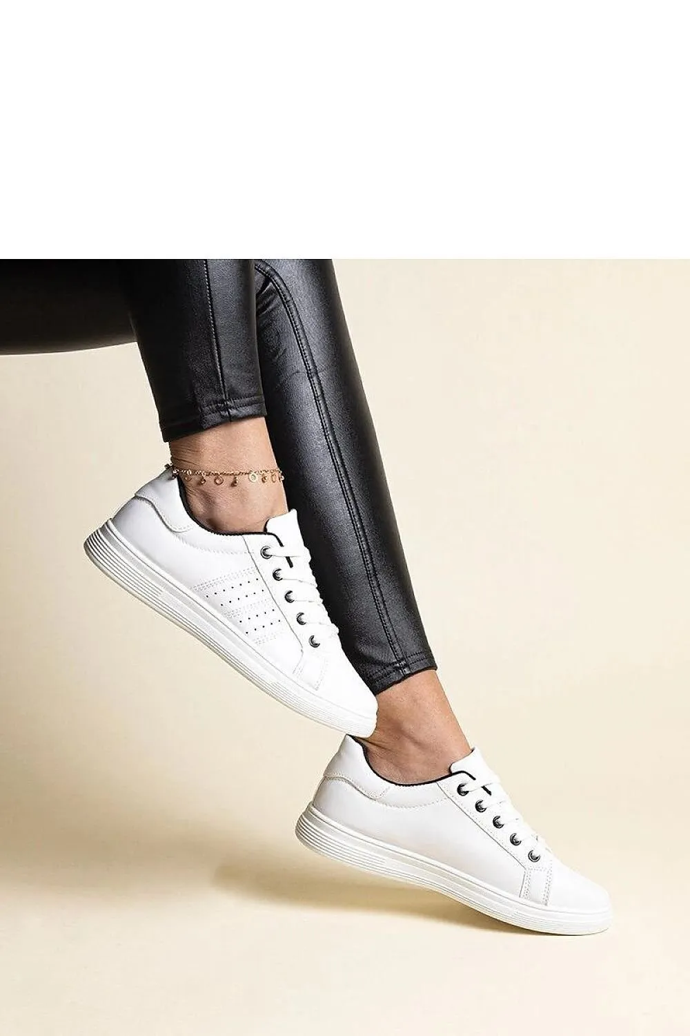 White sneakers with a black element