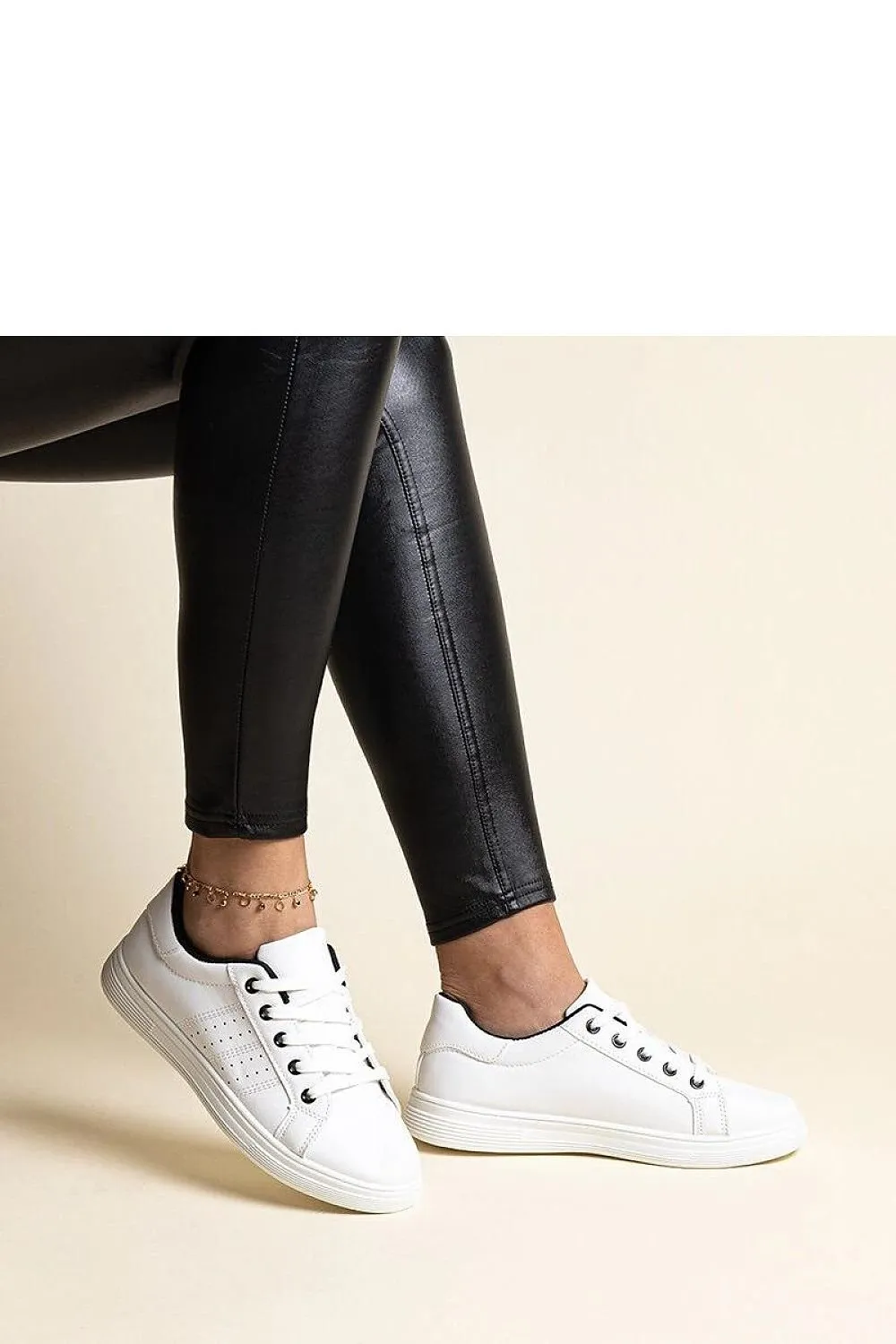 White sneakers with a black element