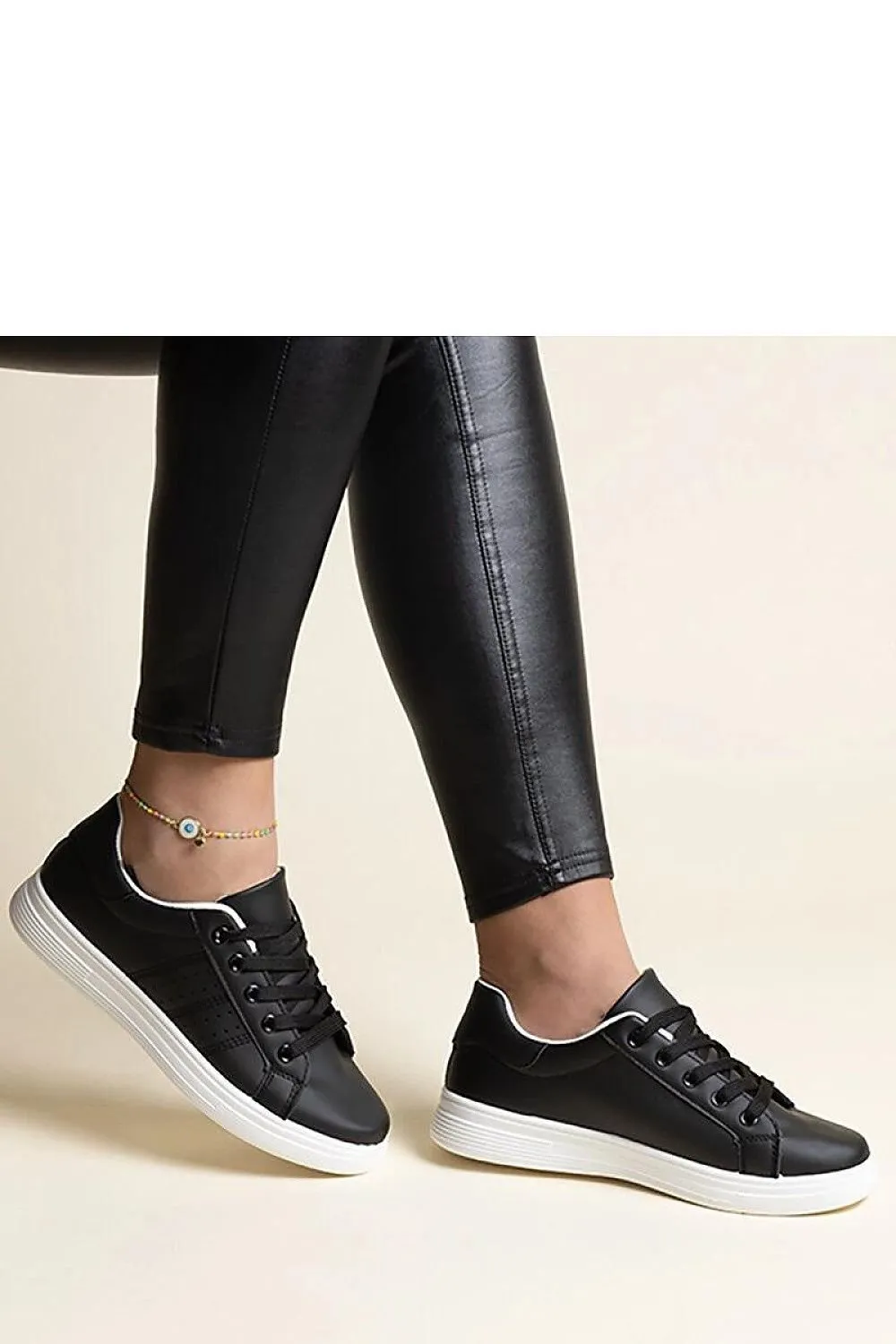 White sneakers with a black element