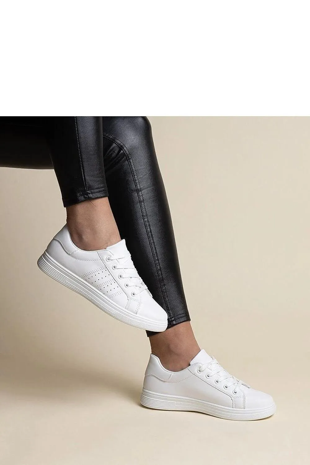 White sneakers with a black element