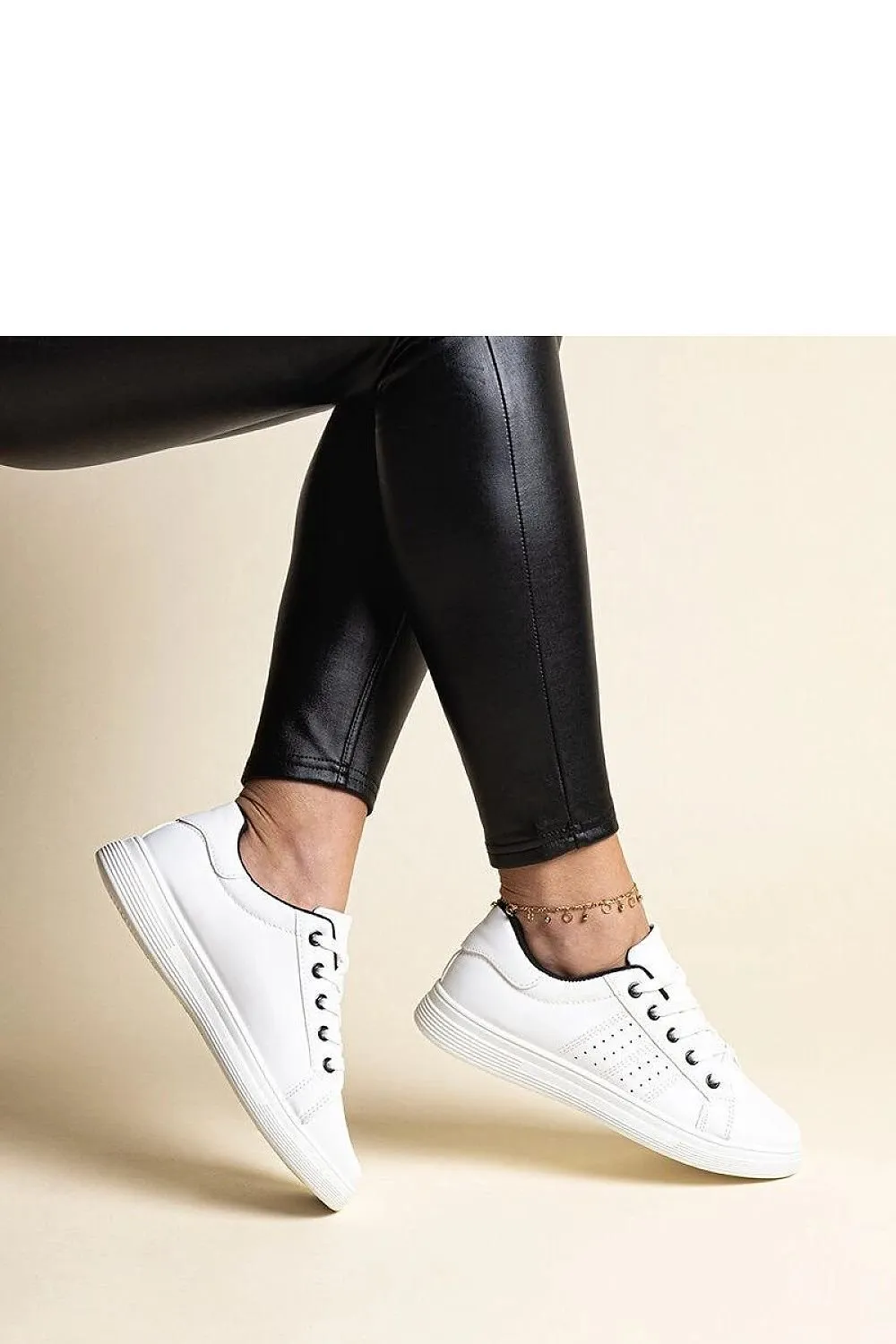 White sneakers with a black element
