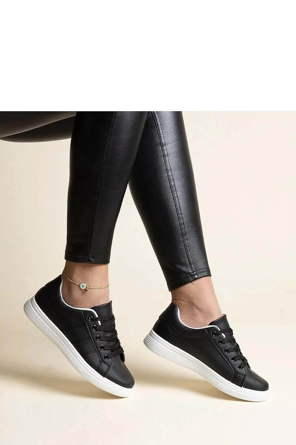White sneakers with a black element